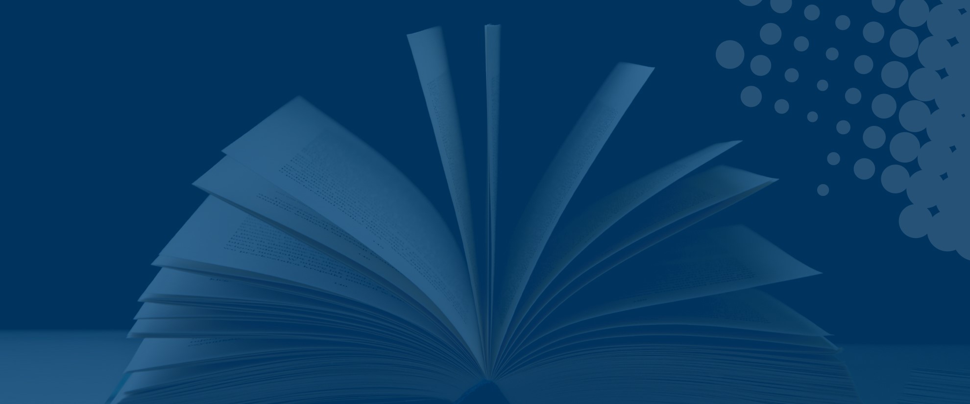 book held open to show individual leafs on blue background